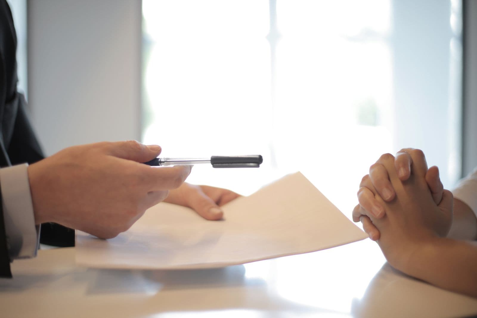 Signing a healthcare business agreement at a desk
