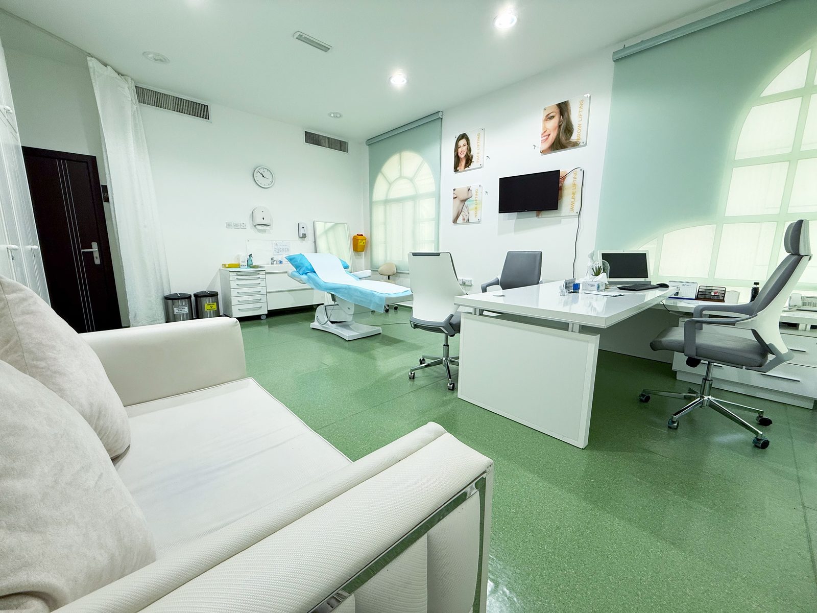 Aesthetics consultation room with patient seating in a poly clinic in Jumeirah, Dubai
