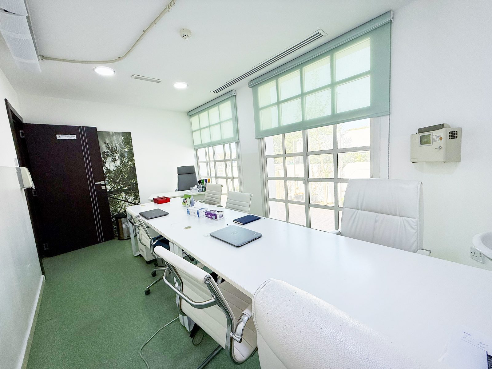 Consultation room with examination couch in a poly clinic in Jumeirah, Dubai